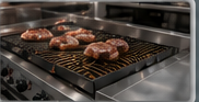 Commercial charbroiler cooking meat